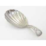 A silver Geo III caddy spoon with shell formed bowl. Hallmarked London 1795. Approx. 3" long