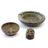 Three items of serpentine ware, comprising a carved lidded pot with foliate decoration and a