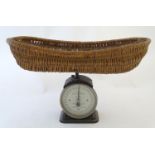 An early 20thC Hughes's Baby Weigher / weighing scales with a wicker basket by Salter. Model no. 48.