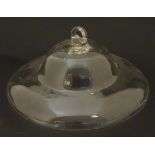 A 19thC clear glass smoke bell, of domed form with looped handle. 10" diameter Please Note - we do