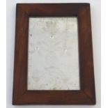 A 19thC mirror with etched floral design in a yew wood frame. Approx. 9 1/4" x 6 3/4" Please