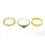 Three various rings including a 22ct gold ring (3) Please Note - we do not make reference to the
