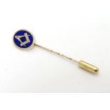 Masonic Interest : A 9ct gold stick pin surmounted by blue enamel oval decoration with masonic