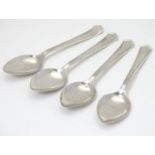 A set of four silver teaspoons hallmarked Sheffield 1945. maker G W Shirtcliffe & Son (George