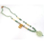 Assorted Jade and cloisonné beads with clasp set with rose quartz cabochon. Please Note - we do