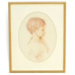 Harold Cox (act. 1921-), English School, Crayon on paper, An oval profile portrait of a young boy,