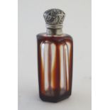 Glass: a late 19th-early 20thC glass scent bottle, of hexagonal form with red outlining and white