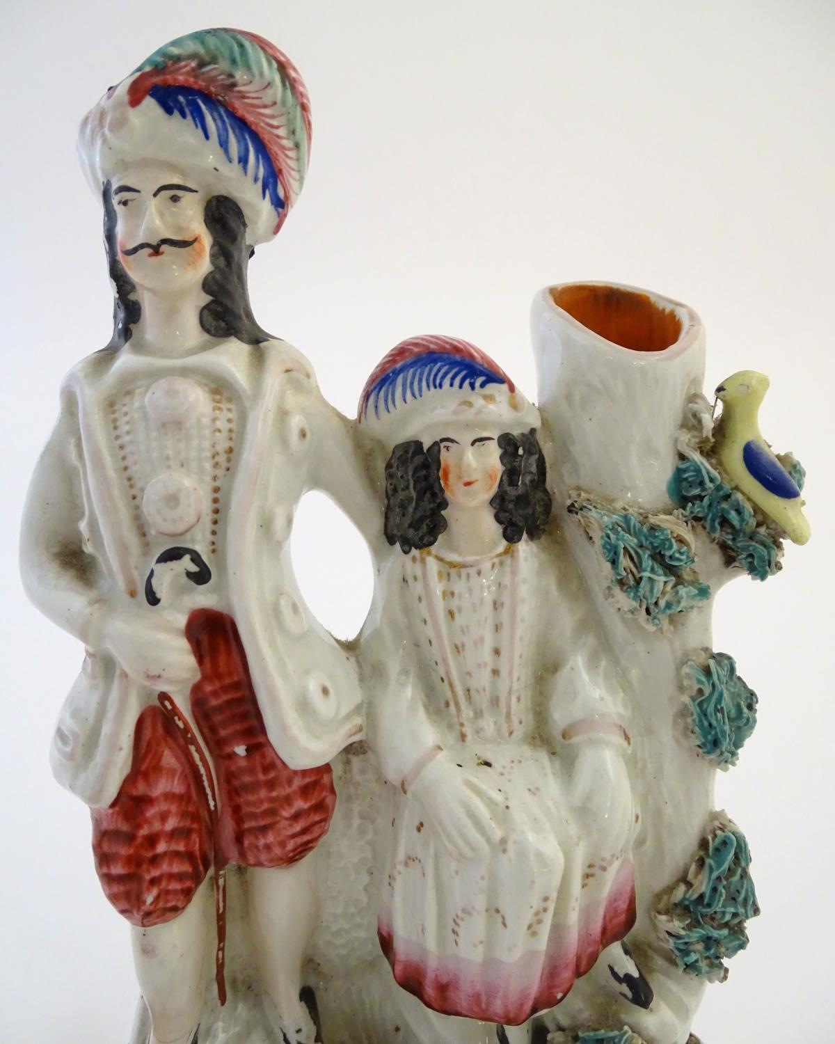 Three items of Staffordshire pottery, to include a figural bud vase, a flatback house and a figure - Image 7 of 9