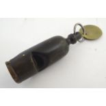 Railwayana: a Victorian carved and turned horn guards' whistle, stamped 'N.E.R.' (North Eastern