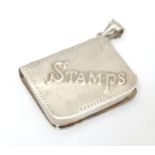 A .925 silver pendant stamp case. 1 1/2" long Please Note - we do not make reference to the