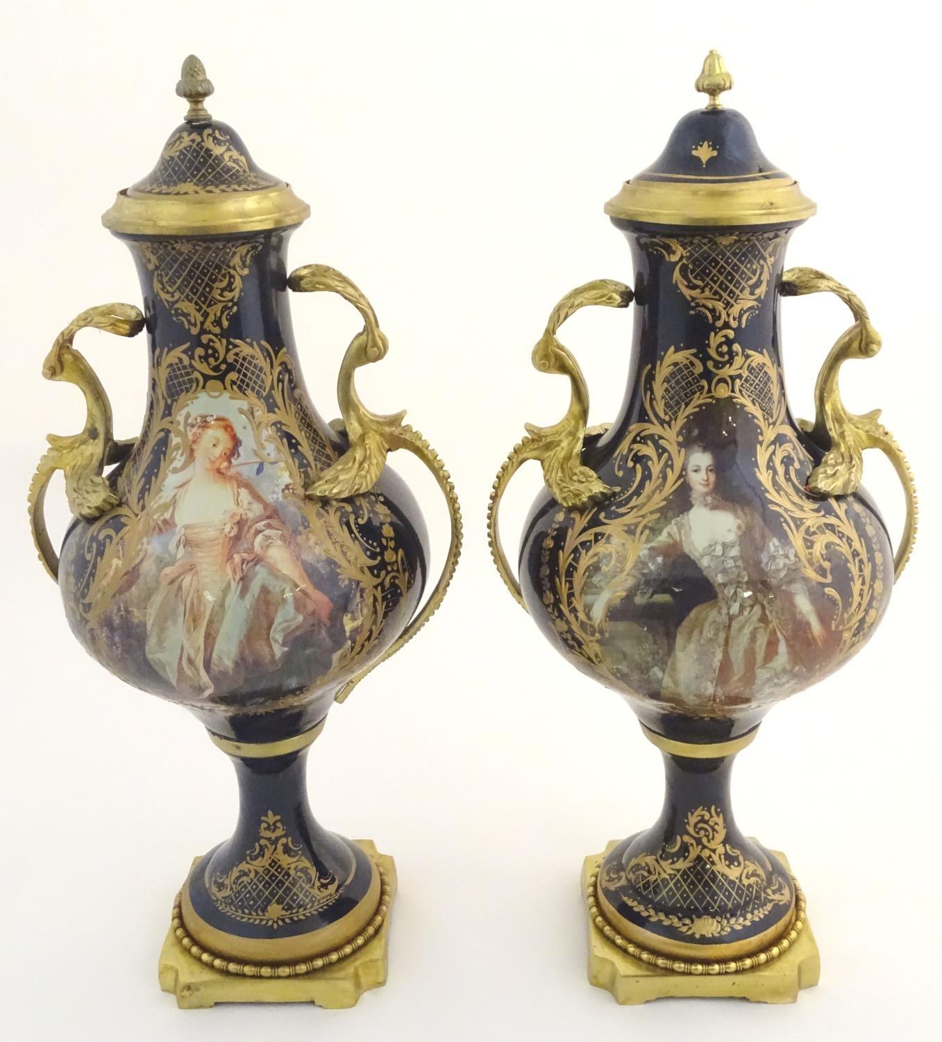A matched pair of Sevres style lidded urn garnitures on mounted bases, with cobalt blue - Image 5 of 11