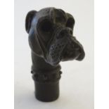 A cast bronze walking stick handle formed as the head of a boxer dog. Approx. 2 3/4" high. Please