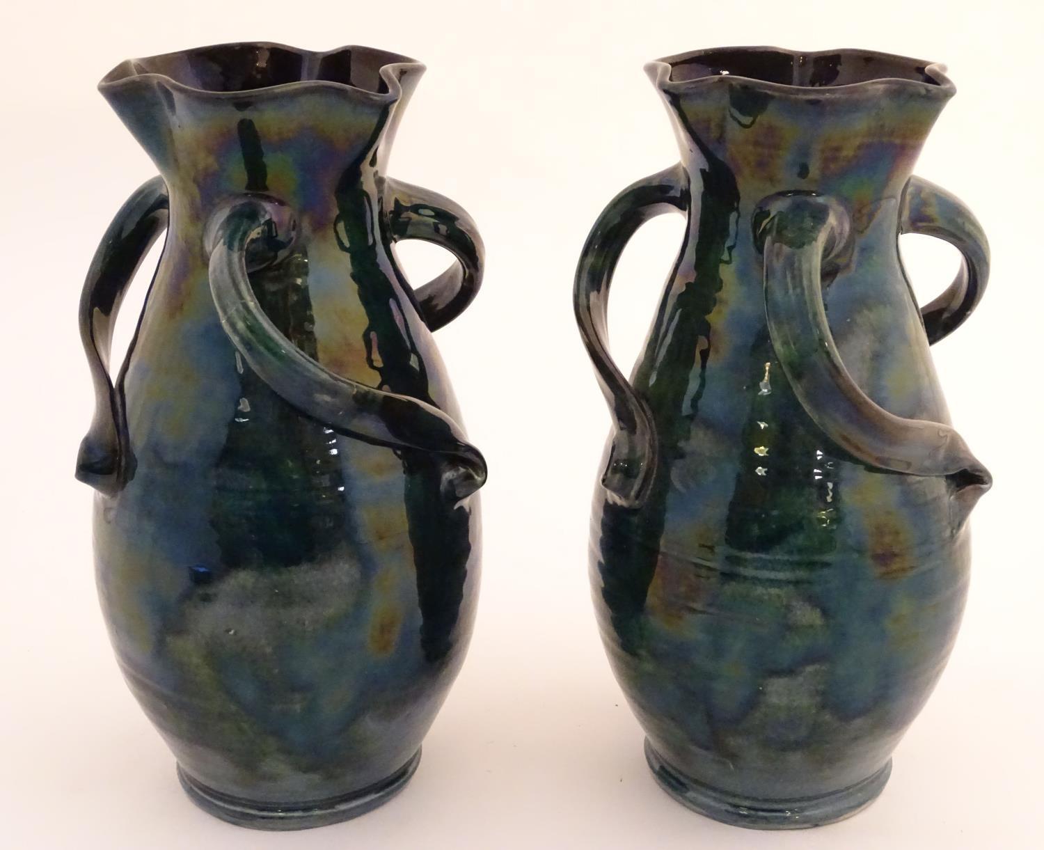 A pair of Baron Barnstaple art nouveau vases in a lustre glaze, with lobed rims and three twisted - Image 4 of 9