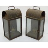 A pair of early-20thC hand oil lamps, glazed on three sides with removable burner and reservoir, the