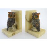 A pair of 20thC stained marble Italian bookends with carved owl decoration. Approx. 5 1/2" high (