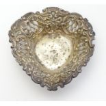 A heart-shaped silver bonbon dish with pierced decoration. Hallmarked Birmingham 1904 maker Henry