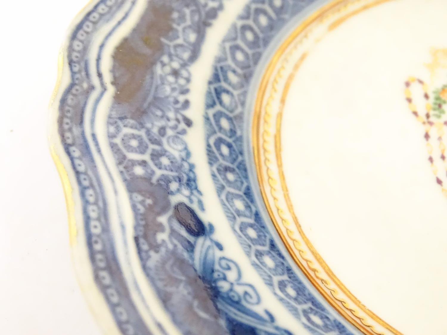 An 18th / 19thC Chinese export blue and white porcelain saucer with blue Fitzhugh borders with - Image 5 of 5