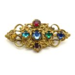 A vintage gilt metal brooch 1 1/4" wide Please Note - we do not make reference to the condition of