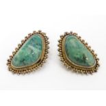 A pair of Israeli silver gilt clip earrings set with malachite hardstone. Approx 1" long Please Note