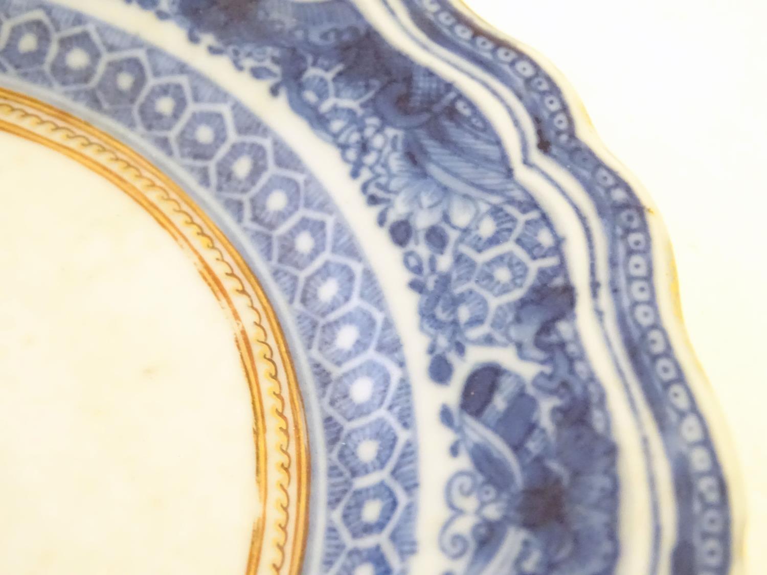 An 18th / 19thC Chinese export blue and white porcelain saucer with blue Fitzhugh borders with - Image 2 of 5