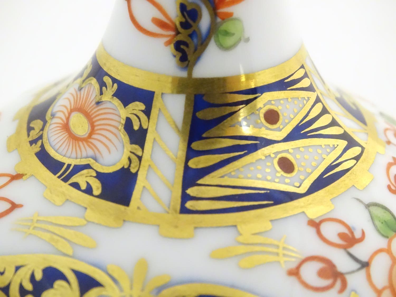 A 19thC Stevenson and Hancock Derby vase decorated with flowers in the Imari palette. Marked - Image 6 of 7