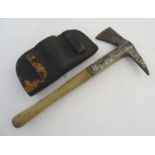 An early-20thC fireman's hand axe, with leather sheath, 15" long Please Note - we do not make