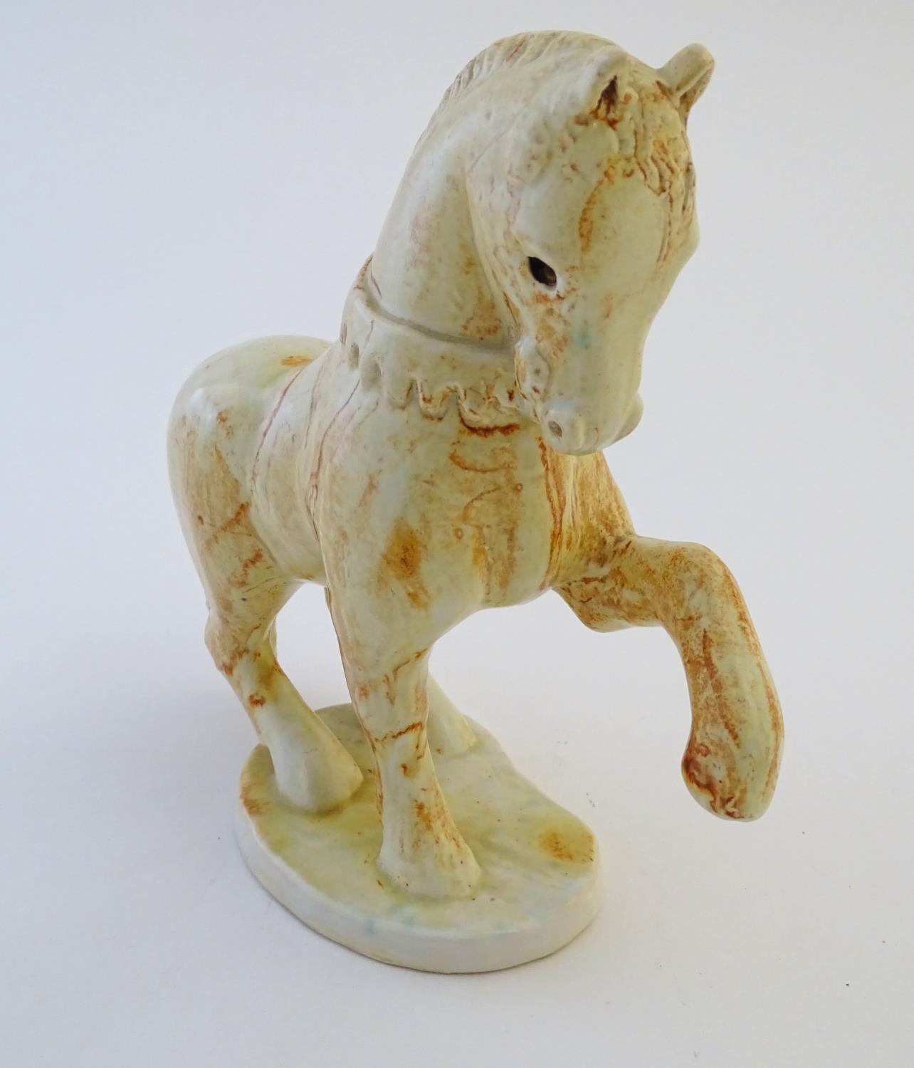 A Paula Humphries studio pottery model of a horse on an oval base. Marked under with impressed bee - Image 3 of 9