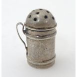 A Victorian novelty miniature pepperette formed as a flour shaker, hallmarked Birmingham 1894, maker
