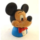 A 20thC money box modelled as Mickey Mouse. Approx. 7 1/2" high Please Note - we do not make