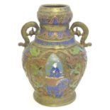 A brass Japanese vase of baluster form with Cloisonné decoration depicting a deity upon an animal