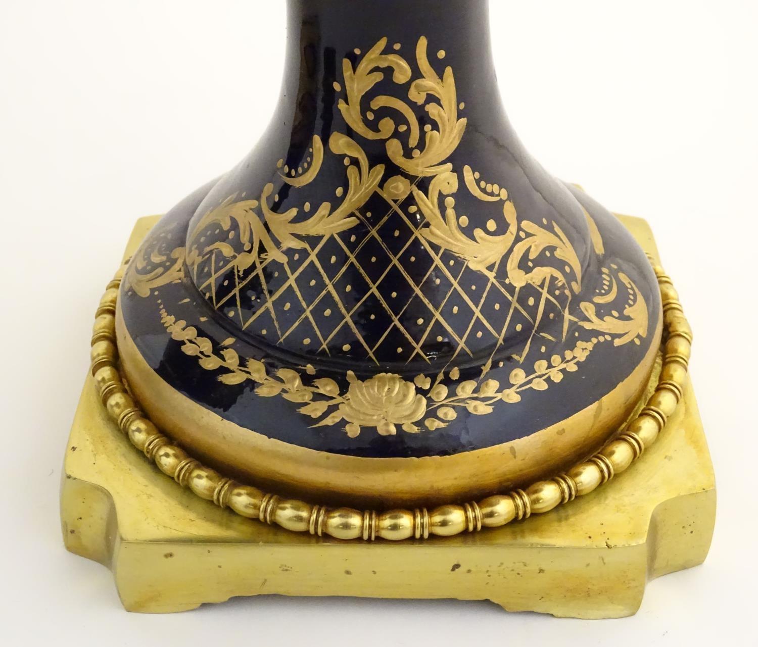 A matched pair of Sevres style lidded urn garnitures on mounted bases, with cobalt blue - Image 7 of 11