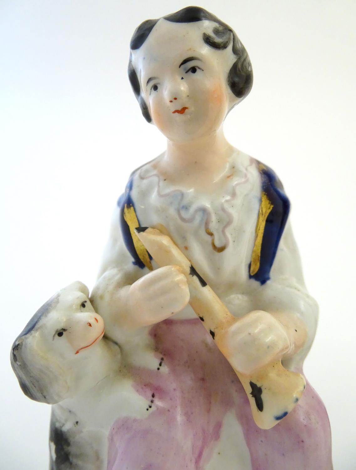 Three items of Staffordshire pottery, to include a figural bud vase, a flatback house and a figure - Image 6 of 9