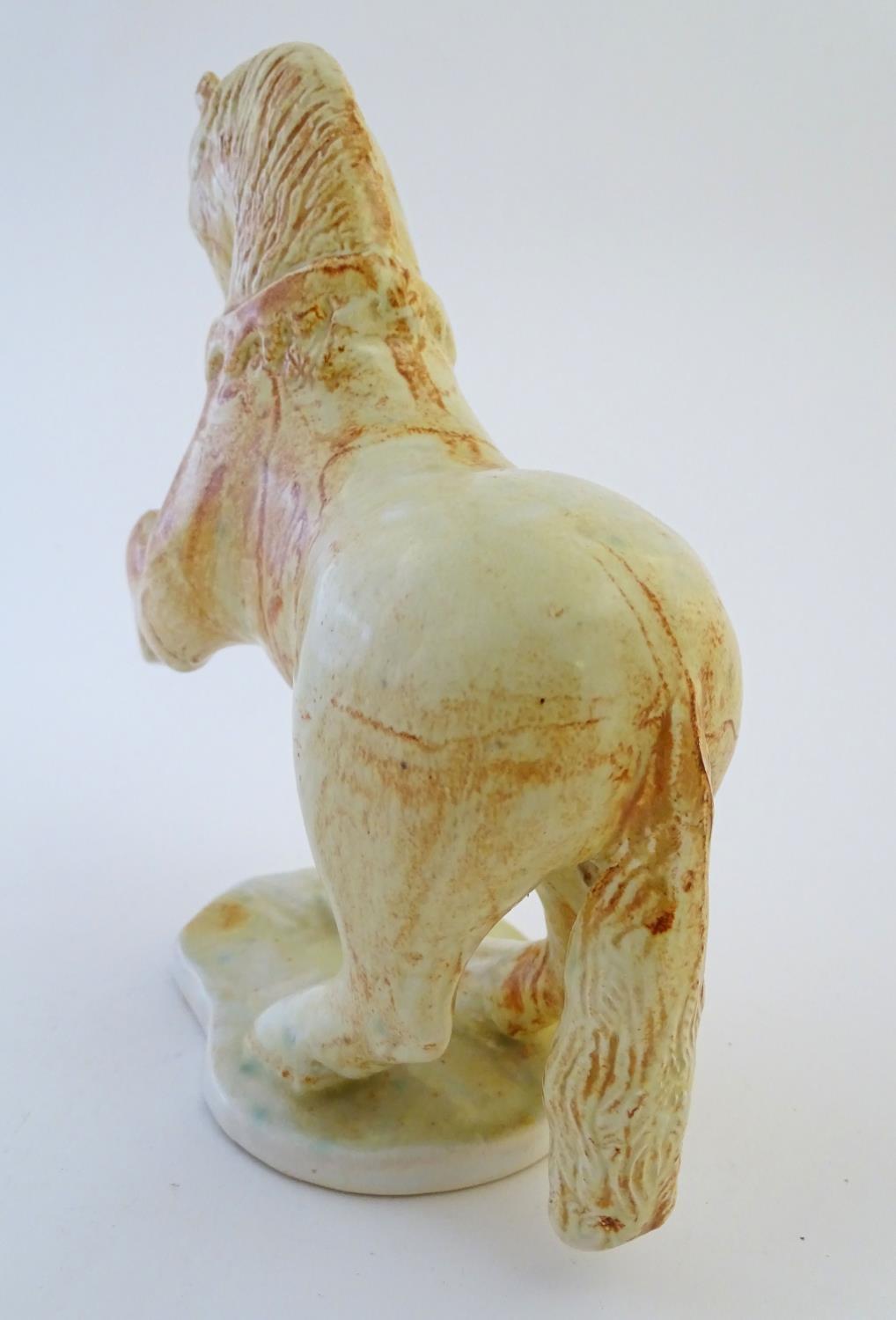 A Paula Humphries studio pottery model of a horse on an oval base. Marked under with impressed bee - Image 6 of 9