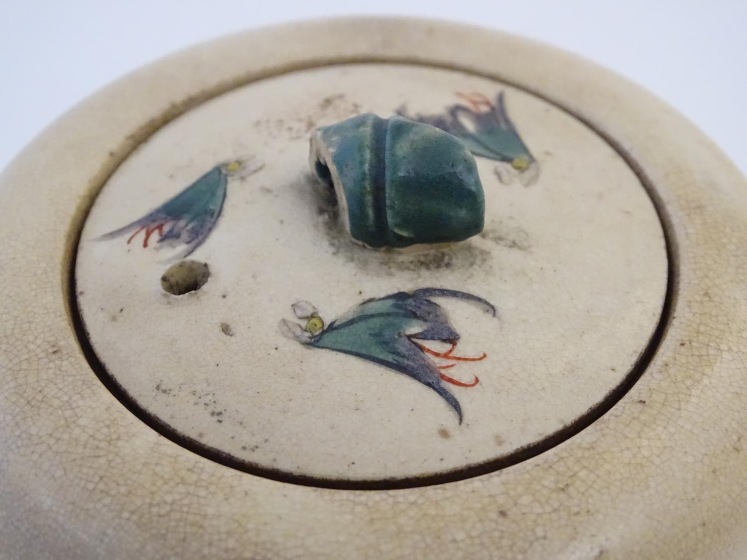 A Japanese teapot and milk jug with hand painted decoration depicting birds and flowers, the handles - Image 7 of 9