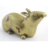 A 20thC bronze model of a rat. Approx. 2" high. Please Note - we do not make reference to the