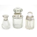 Three glass scent bottles with silver lids/collars. Hallmarked London 1898 maker William Amaziah