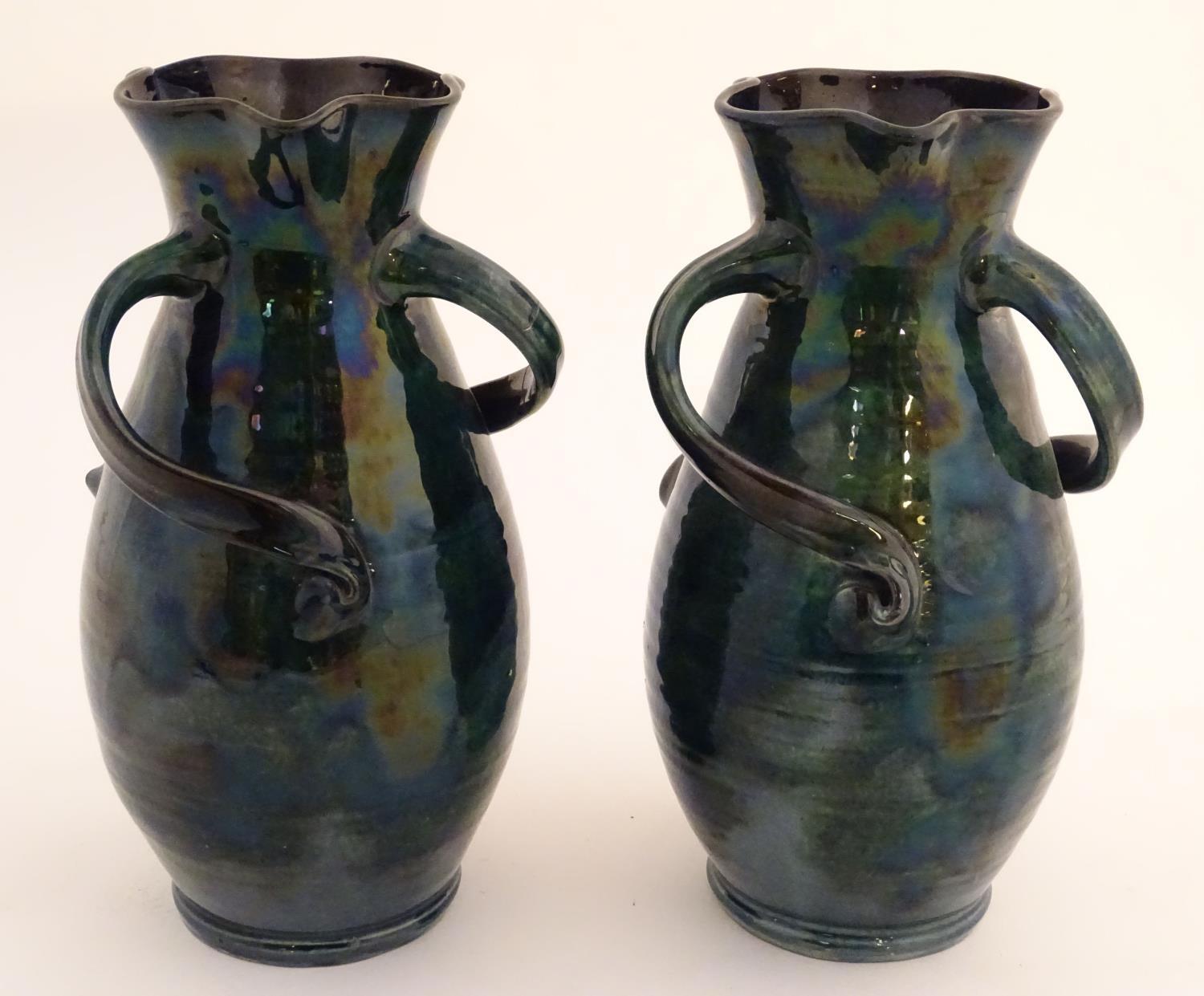 A pair of Baron Barnstaple art nouveau vases in a lustre glaze, with lobed rims and three twisted - Image 3 of 9