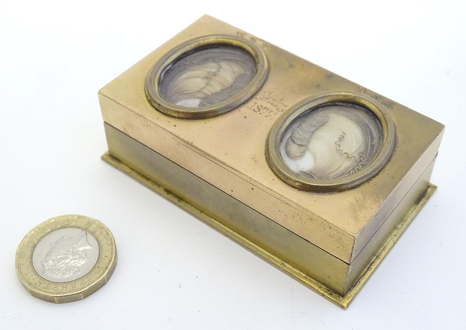 An unusual Victorian gilt metal box set with twin oval locket sections to lid containing locks of - Image 11 of 15