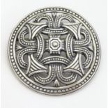 A Scandinavian .925 silver brooch / pendant of circular form with Celtic / Viking decoration