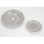 Two white metal dishes with floral and foliate decoration. The largest 6" diameter Please Note -