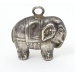 A silver rattle of pendant form, formed as an elephant, hallmarked Birmingham c. 1967, maker WHC.