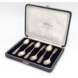 A cased set of 6 teaspoons marked silver, the case marked Duel Craft Jewellers... Calcutta. Please