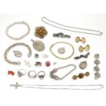 Assorted jewellery including silver brooches, rings, pendants etc Please Note - we do not make