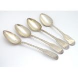 A set of four Geo III silver fiddle pattern table spoons. Hallmarked London 1798 maker George Smith.