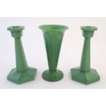 Glass: an Art Deco green opaque glass mantle set, comprising vase and two candlesticks (each 7 3/