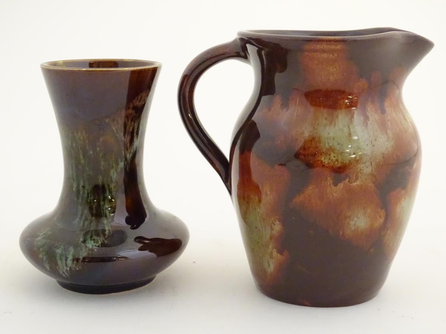 A Welsh Ewenny studio pottery earthenware jug with a mottled glaze. Marked under. Together with a - Image 5 of 9