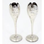 A pair of silver bud vases Hallmarked Chester 1909. Approx 5" high Please Note - we do not make