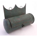 A 19thC cylindrical tin wall hanging candle box with tole peinte decoration. Approx. 8 1/4" x 10 1/