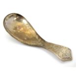 A Geo III Scottish silver caddy spoon with bright cut decoration. Approx. 3 1/2" long Please