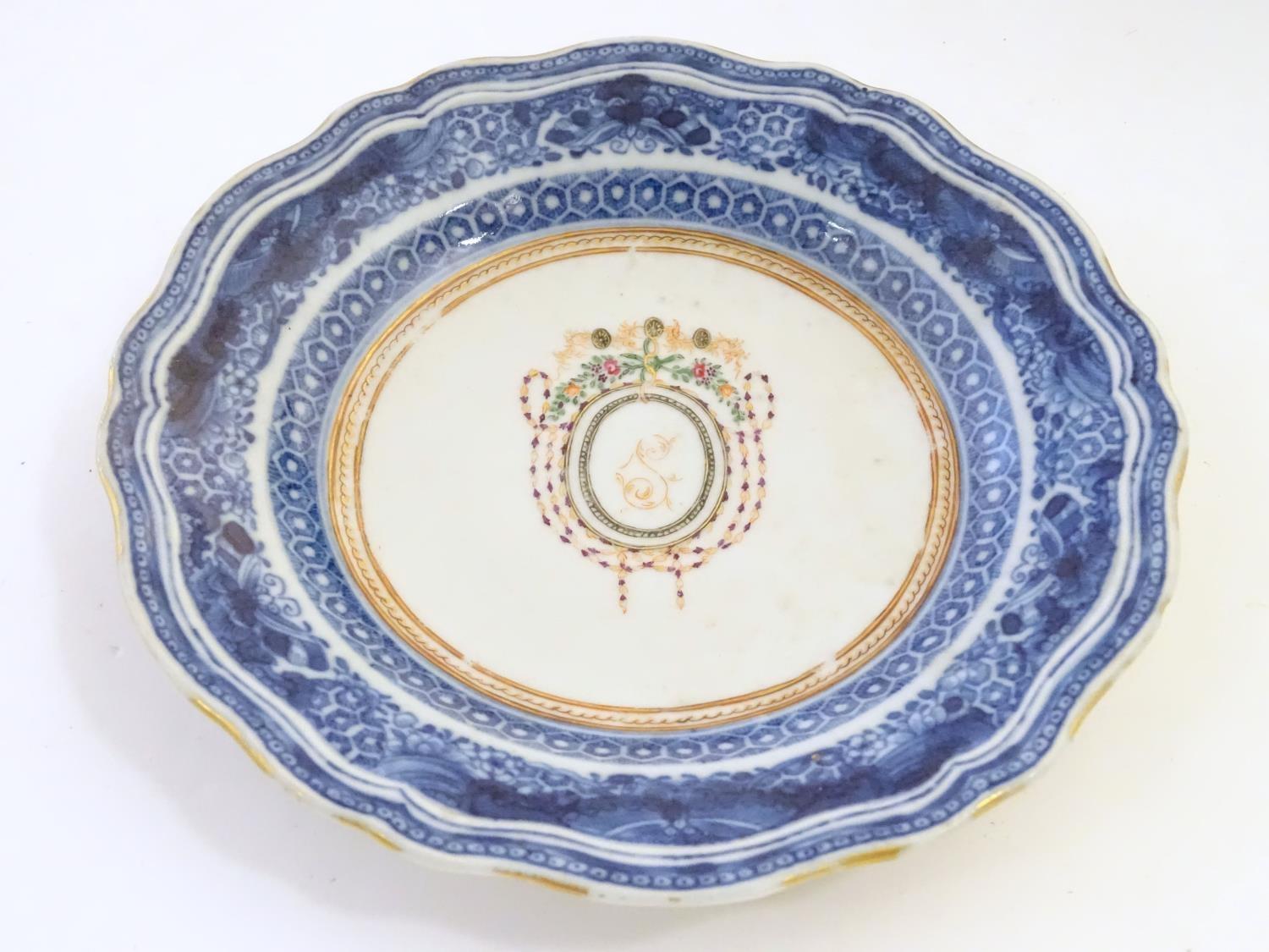 An 18th / 19thC Chinese export blue and white porcelain saucer with blue Fitzhugh borders with